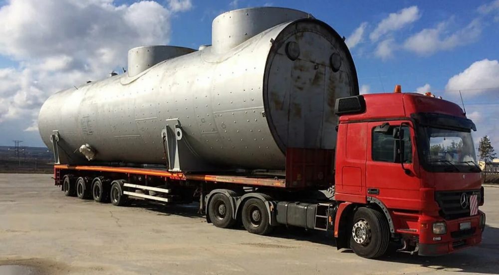Перевозка негабаритных емкостей и цистерн на трале стоимость услуг и где заказать - Гуляйполе